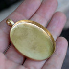 Oval  pendent bezel