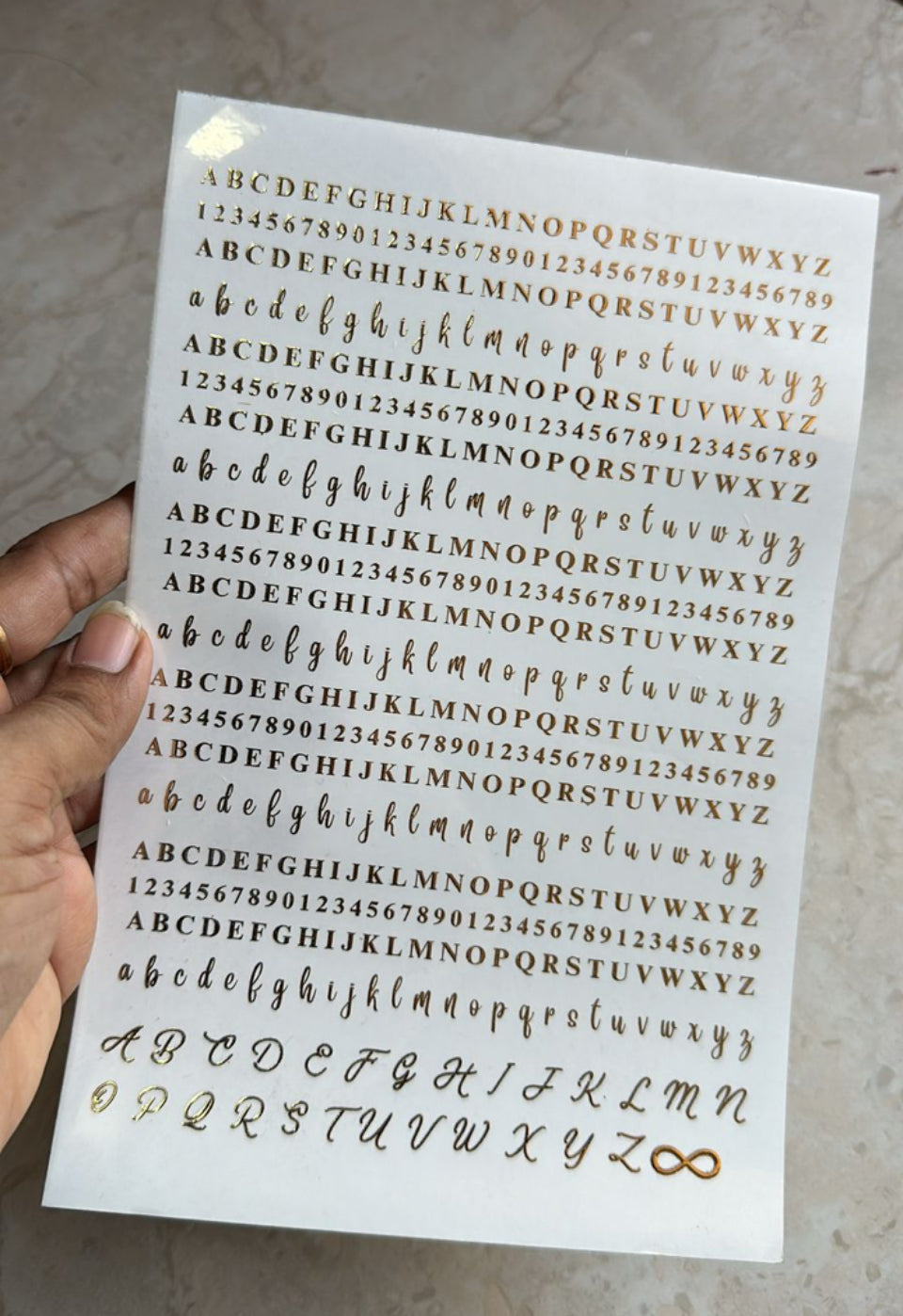 Small alphabet design Golden Embossed stickers